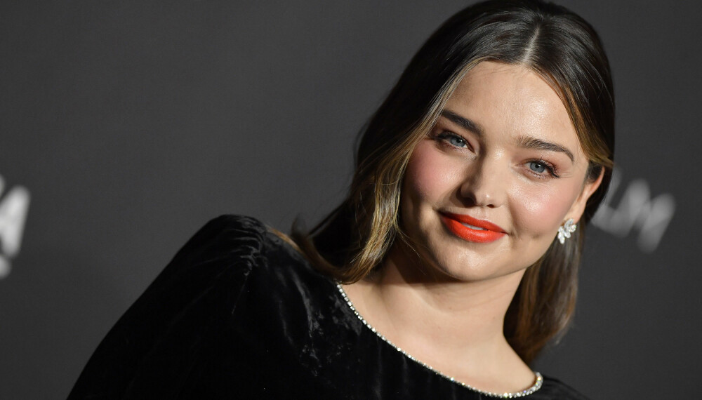 TRIVES: Miranda Kerr er fornøyd med kroppen sin etter å ha blitt mor for andre gang. Hun oppfordrer kvinner til å tenke at de ikke trenger å ha hastverk med å komme i form etter en fødsel. TRIVES: Miranda Kerr er fornøyd med kroppen sin etter å ha blitt mor for andre gang. Hun oppfordrer kvinner til å tenke at de ikke trenger å ha hastverk med å komme i form etter en fødsel.